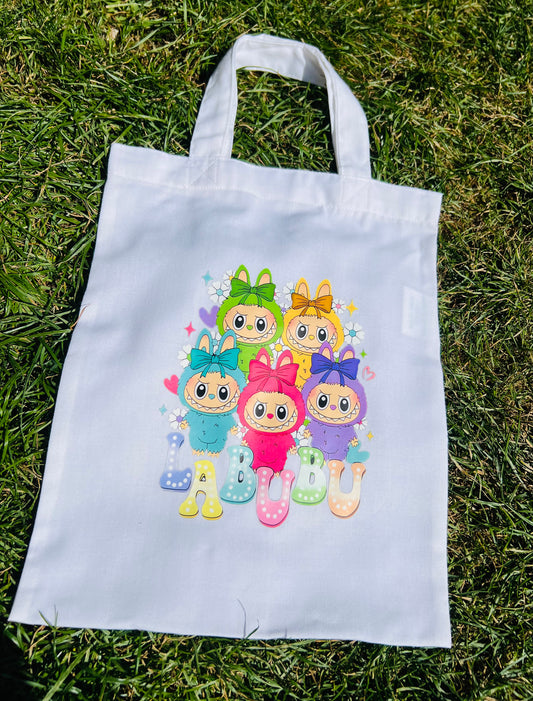 Little monster tote bags