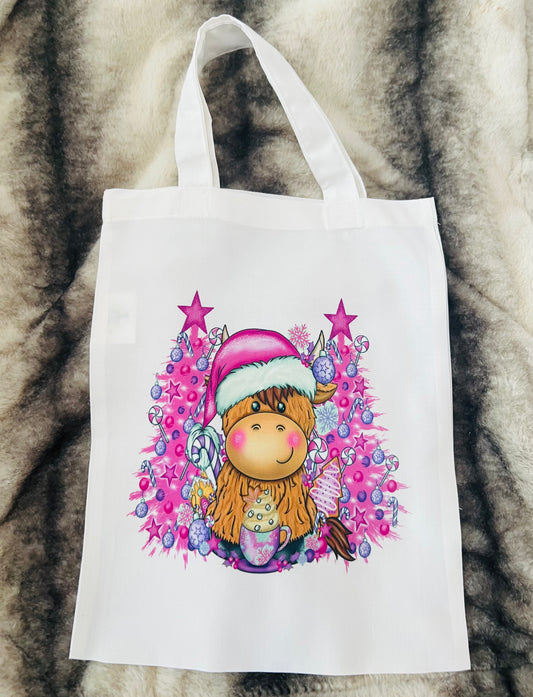 Pink Christmas highland cow tote bag